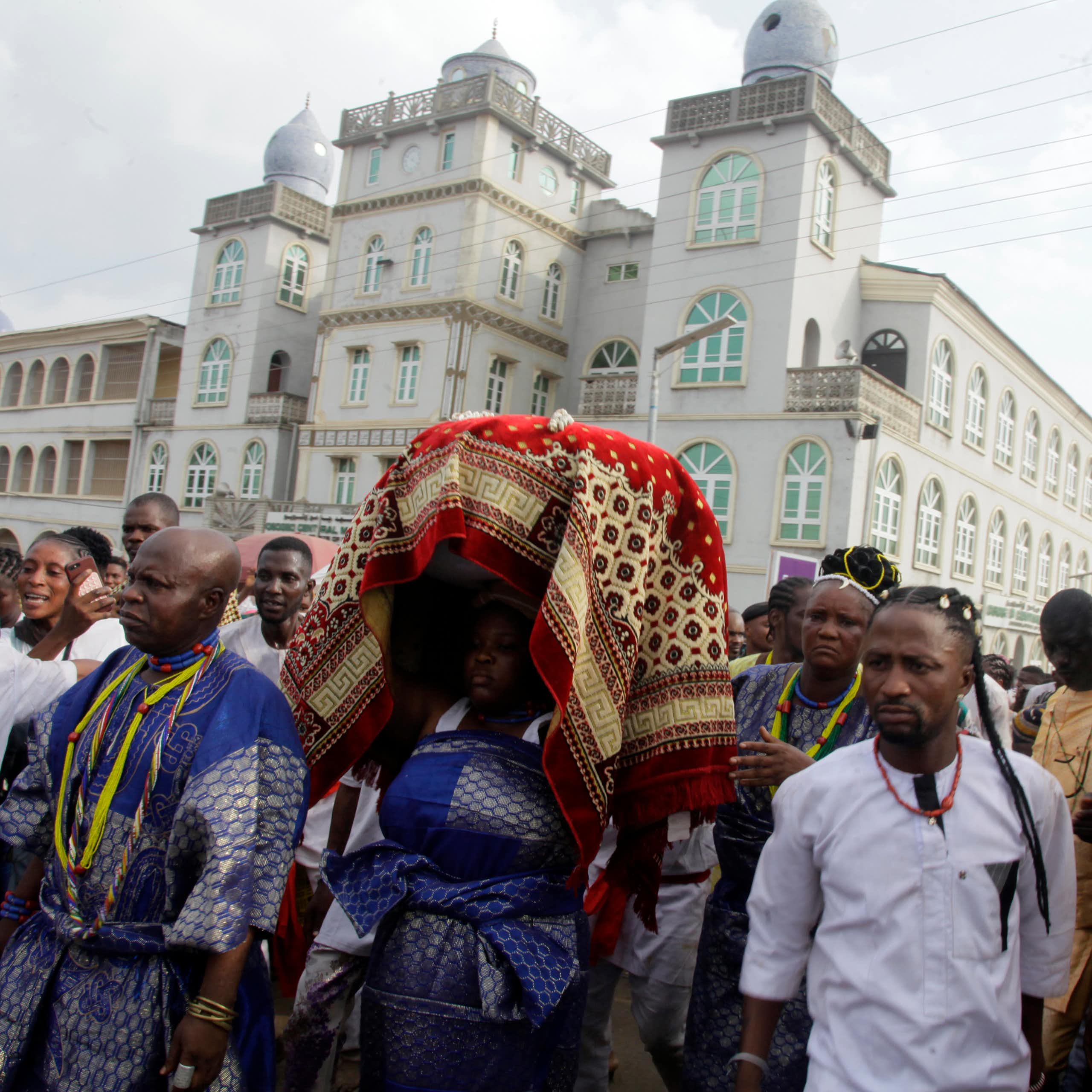 A group of people in a procession 