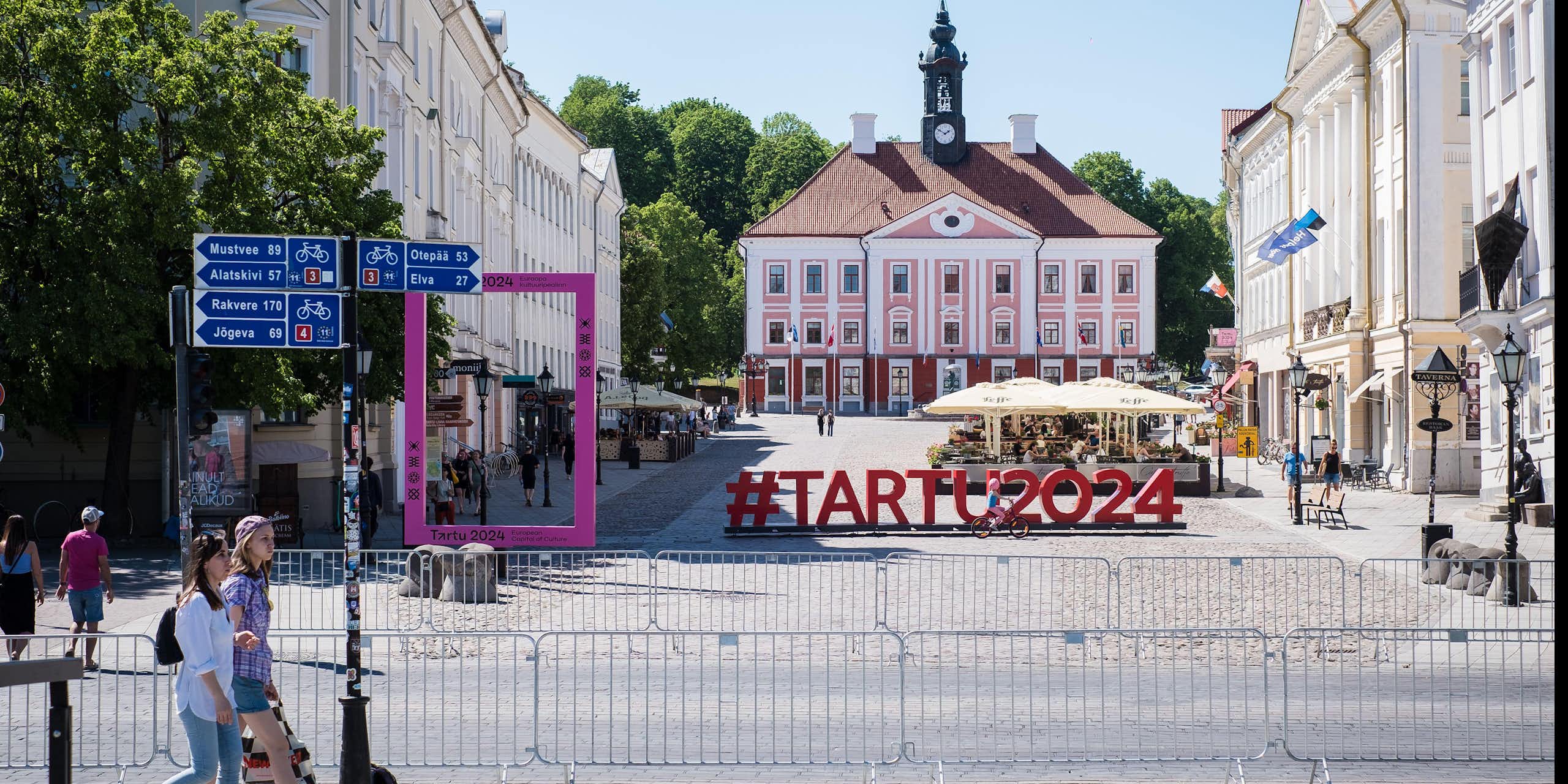 Tartu's town hall with a large sign promoting Tartu as 2024 European capital of culture.