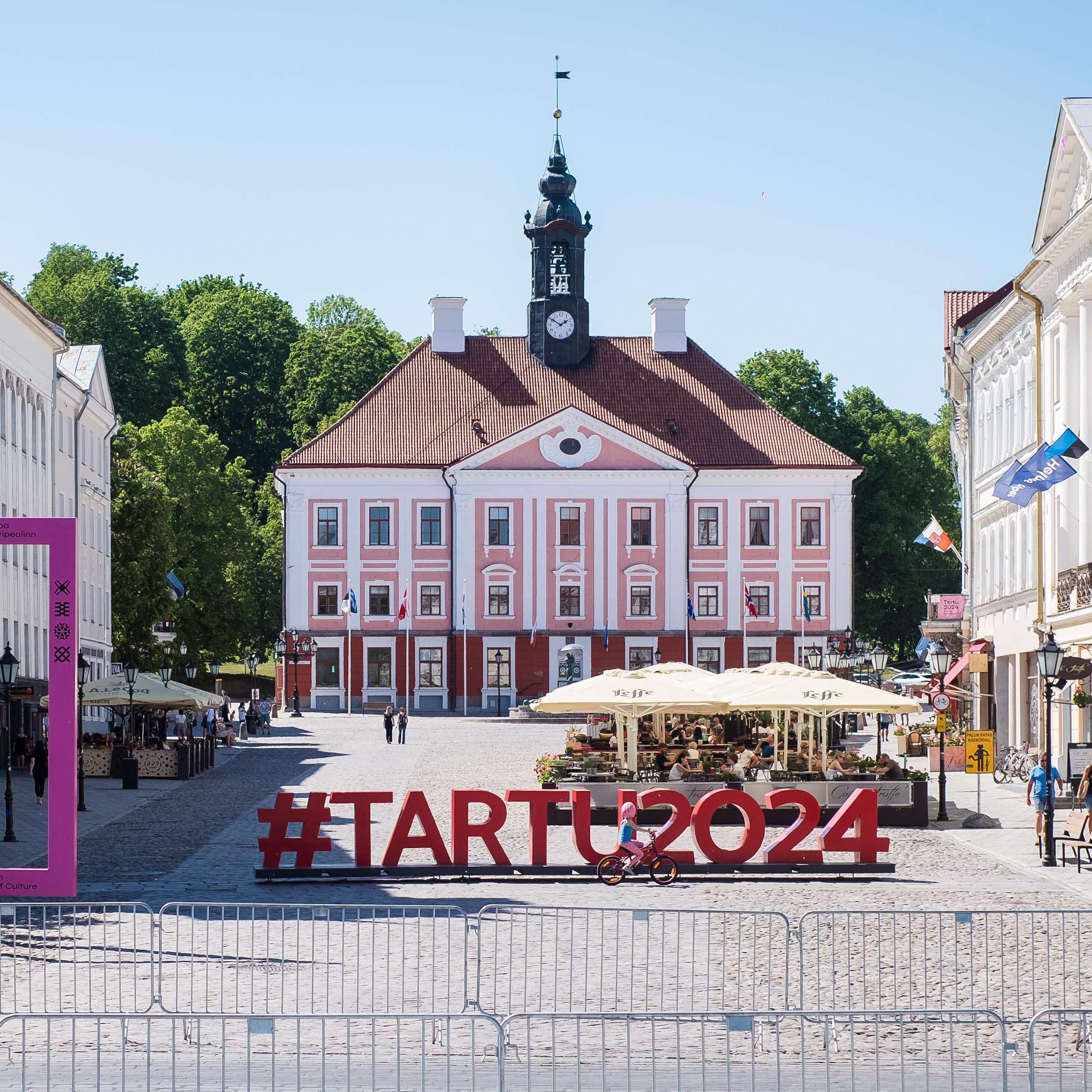 Tartu's town hall with a large sign promoting Tartu as 2024 European capital of culture.