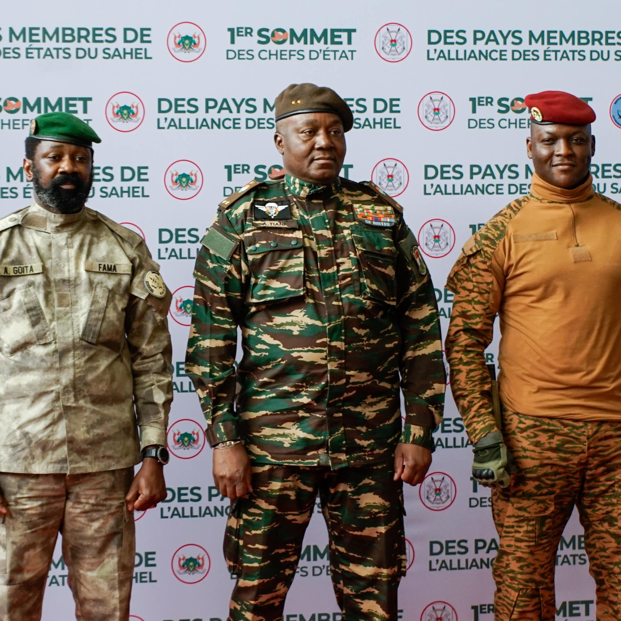 The junta leaders in Mali, Burkina Faso and Niger pose for photos.