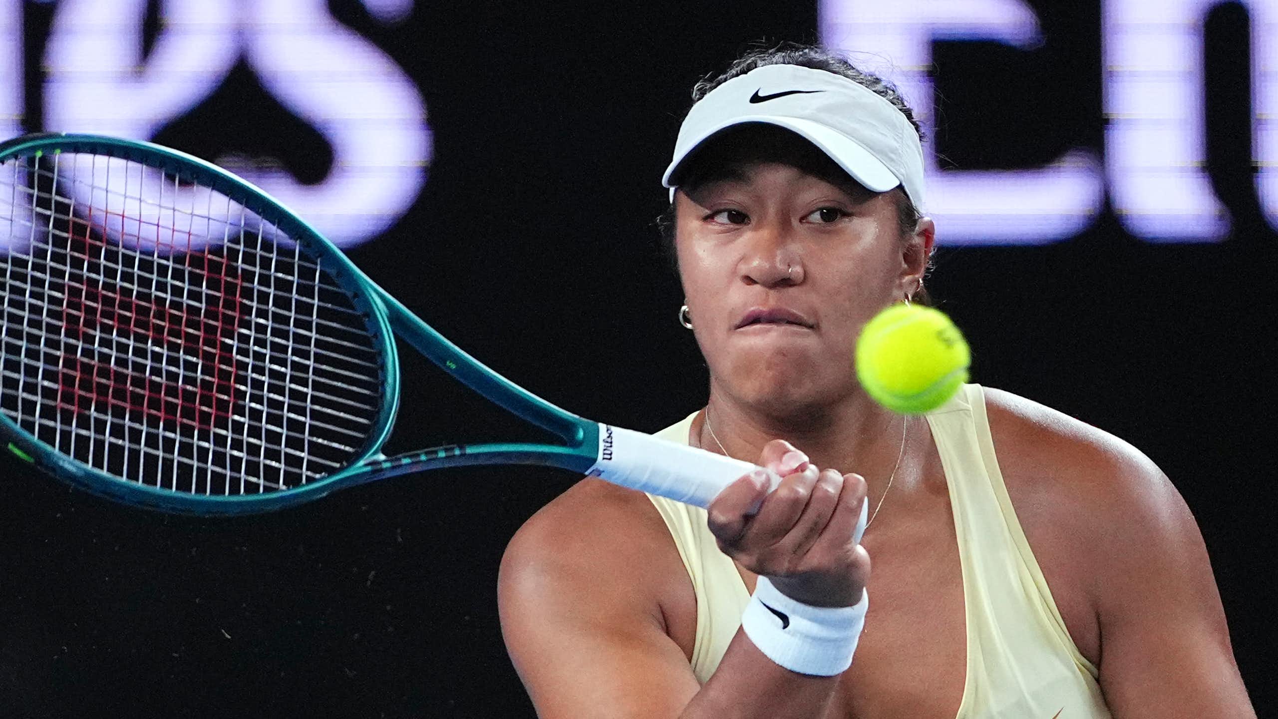 Destanee Aiava hits a tennis ball at the Australian Open.