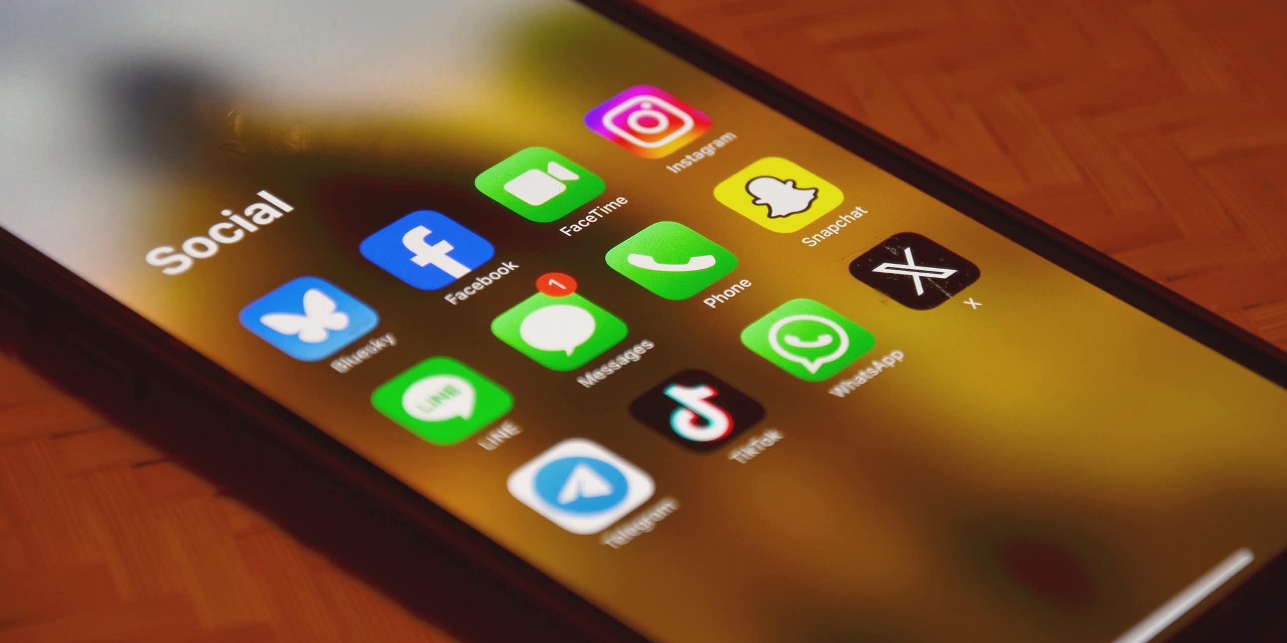 A smartphone displaying the icons for various social media apps