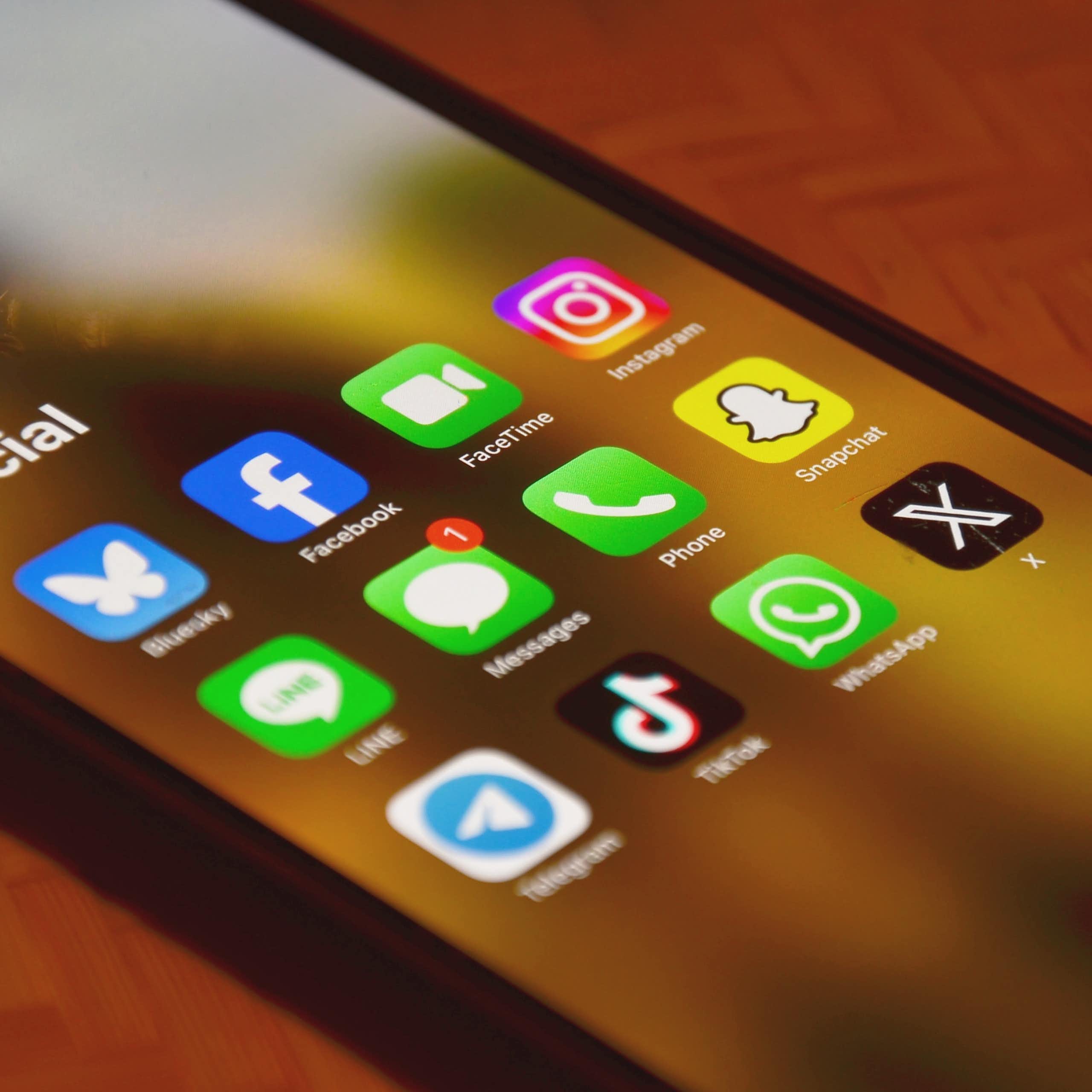 A smartphone displaying the icons for various social media apps